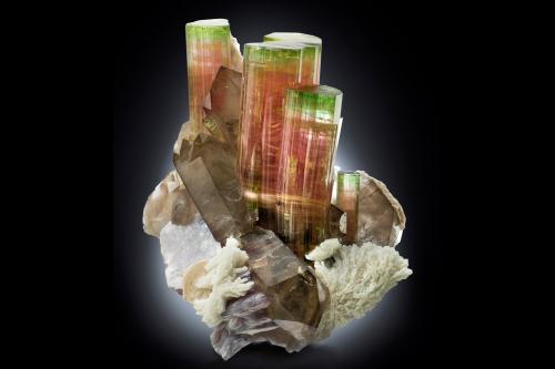 Elbaite with Orthoclase, 'lepidolite', Albite and Quartz (variety smoky)<br />Paprok, Distrito Kamdesh, Provincia Nuristan, Afganistán<br />14.5 x 12 x 16 cm / main crystal: 9.2 cm.<br /> (Author: MIM Museum)