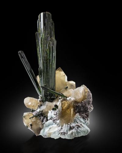 Elbaite (variety verdelite) on Quartz (variety smoky) and with Albite and 'lepidolite'<br />Mina Cruzeiro, Santa Maria do Suaçui, Governador Valadares, Vale do Rio Doce, Minas Gerais, Brasil<br />56 x 37 x 45 cm / main crystal: 49 cm<br /> (Author: MIM Museum)