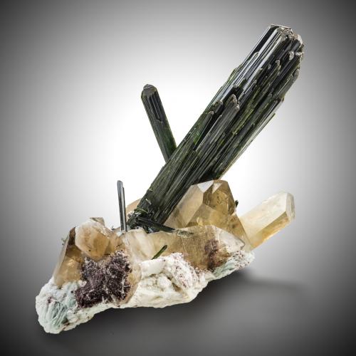 Elbaite (variety verdelite) on Quartz (variety smoky) and with Albite and 'lepidolite'<br />Mina Cruzeiro, Santa Maria do Suaçui, Governador Valadares, Vale do Rio Doce, Minas Gerais, Brasil<br />56 x 37 x 45 cm / main crystal: 49 cm<br /> (Author: MIM Museum)