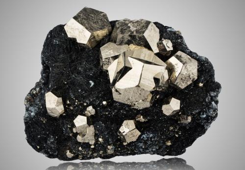 Pyrite with Hematite<br />Mina Rio (Mina Rio Marina), realce Valle Giove, Rio Marina, Isla de Elba, Provincia Livorno, Toscana, Italia<br />25 x 13 x 17.5 cm / main crystal: 7.5 cm<br /> (Author: MIM Museum)