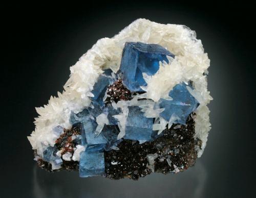 Fluorite, Sphalerite, and Calcite<br />Mina Minerva I, Grupo Ozark-Mahoning, Sub-Distrito Cave-in-Rock, Condado Hardin, Illinois, USA<br />8x7x6 cm overall size<br /> (Author: Jesse Fisher)