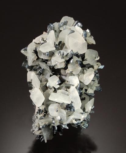 Calcite on Stibnite<br />Mina Herja, Chiuzbaia, Baia Sprie, Maramures, Rumanía<br />3.5 cm x 7.0 cm<br /> (Author: Michael Shaw)