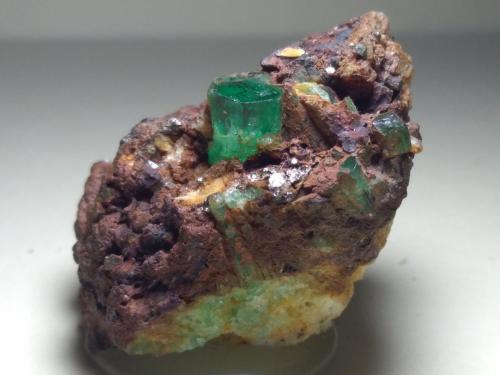 Beryl (variety emerald), Pyrite<br />Muzo (distrito minero), Cinturón Esmeraldífero Occidental, Departamento Boyacá, Colombia<br />42 x 27 mm<br /> (Author: Sante Celiberti)