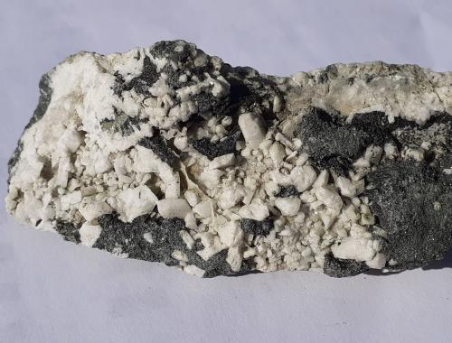 Albite (variety Pericline), Chlorite-group<br />Moaralm, Habach Valley, Hohe Tauern, Salzburg, Austria<br />7,5 x 3 cm<br /> (Author: Volkmar Stingl)