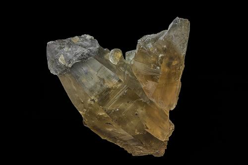 Quartz (variety smoky quartz), Calcite, Pyrite, Muscovite<br />Mina Rist, Hiddenite, Condado Alexander, North Carolina, USA<br />9.9 x 7.8 cm<br /> (Author: am mizunaka)