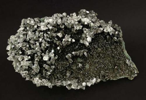 Apophyllite-(KF) with Julgoldite-(Fe)
Jalgaon, Maharashtra, India
Mined about 2000
Specimen size: 20 × 13 × 5 cm
Main crystal size: 1.4 × 0.5 cm
Former Jan Buma collection
Photo: Reference Specimens -> http://www.fabreminerals.com/specimens/RSBUM-buma-notable-specimens.php#JV58F2 (Author: Jordi Fabre)