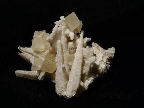 Calcite + stilbite. Same specimen as Skye Minerals 094 seen previously, from a slightly different angle. Specimen is 58mm high and 80mm wide from this angle. Self-collected 1998 from Camas na h-Uamha, Duirinish, Isle of Skye. (Author: Mike Wood)