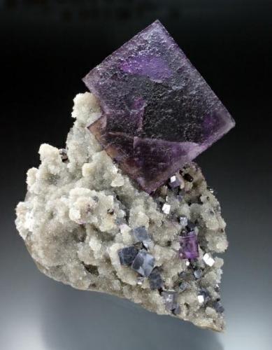 Fluorite with galena and quartz
Hill-Ledford Mine, Cave-in-Rock, Hardin County, Illinois
fluorite 4.5 cm on edge (Author: Jesse Fisher)