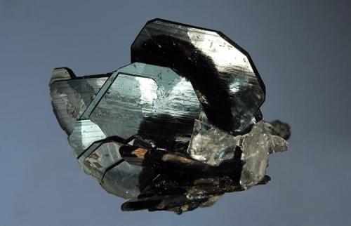 Hematite
Cavradi Gorge, Curnera Valley, Grischun, Switzerland
3.0 x 4.0 cm.
Lustrous bladed hematite crystals to 1.6 cm. with small quartz crystals and rutile. Collected 6-04-97 by Swiss strahler Theodosi Venzin. (Author: crosstimber)