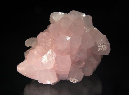 Calcite
Androvo Mine, Erma Reka, Zlatograd District, Smolyan Oblast, Bulgaria
7.5 x 9.0 cm.
Pale pink scalenohedrons with low-angle rhomb terminations.  Mined in summer 2004. (Author: crosstimber)