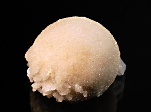 Calcite
Herja Mine, Baia Mare, Maramures, Romania
5.2 x 5.6 cm.
Hemispherical-shaped crystallized cream-colored calcite. (Author: crosstimber)