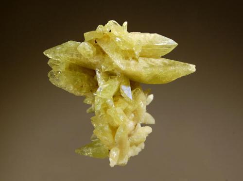 Brazilianite
Córrego Frio Mine, Linópolis, Divino das Laranjeiras , Minas Gerais, Brazil
4.7 x 5.4 cm.
Intergrown group of pale yellow-green, doubly-terminated, spear-shaped crystals. (Author: crosstimber)