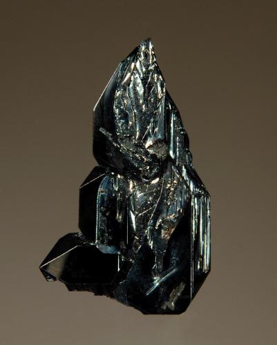 Hematite
Nador, Oriental Region, Morocco
1.5 x 2.8 cm.
A spear-shaped crystal of hematite with lustrous faces. (Author: crosstimber)