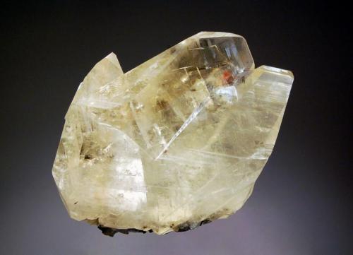 Calcite
Jiepaiyu Mine, Shimen, Changde Pref., Hunan Prov., China
6.5 x 7.5 cm.
Sharp pale yellow, somewhat flattened scalenohedral crystals with minor realgar inclusions. (Author: crosstimber)