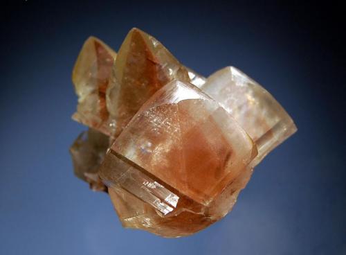 Calcite
Leiping Mine, Guiyang Co., Chenzhou Pref,, Hunan Prov., China
5.0 x 5.2 cm
A group of colorless calcite crystals with clearly visible hematite-coated,reddish brown scalenohedral phantoms. (Author: crosstimber)