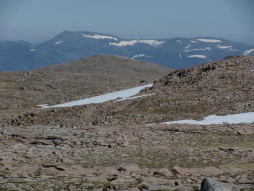 Back up on the plateau again, heading towards where my gear is stashed. I know it’s over there somewhere hidden in the rocks...
 Seriously though if it had become foggy I might never have found it. Good job it was a nice day. (Author: Mike Wood)