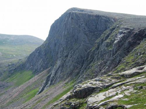 Carn Etchachan (1120m) and Shelter Stone Crag, at the head of Loch Avon in the Cairngorms. The cliff is about 800 feet high (~250m) and is popular for hard climbers, both in summer and in winter. (Author: Mike Wood)