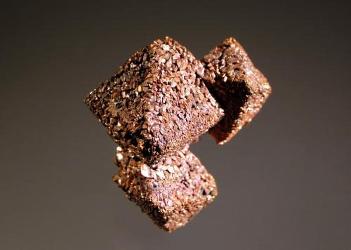 Copper ps. after cuprite
Poteryaevskoe Mine, Rubtsovskoe Cu-Zn-Pb deposit, Rudnyi Altai, Western-Siberian Region, Russia
2.8 x 3.0 cm
Sharp pseudomorphs of native copper after octahedral cuprite crystals. (Author: crosstimber)