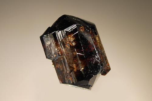 Cassiterite
Merekski District, Burea Massif, Khabarovskiy Kray, Far-Eastern Region, Russia
3.0 x 3.5 cm
Stout, doubly-terminated, prismatic crystal with high luster and several gemmy sections. (Author: crosstimber)