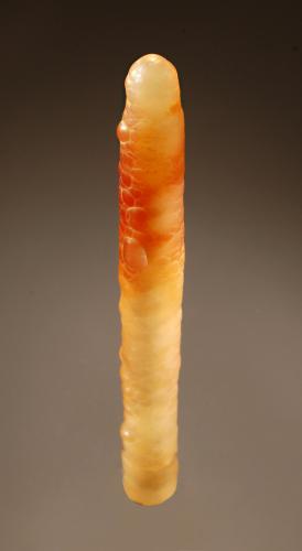 Chalcedony
near Mt. Merapi, Java, Indonesia
1.8 x 14.3 cm.
A translucent stalactite of chalcedony with a prominent hollow central channel. (Author: crosstimber)