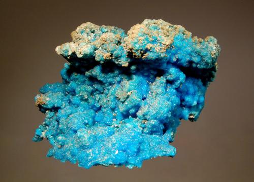 Chalcanthite
Murgul Cu-Zn-Pb deposit, Murgul, Artvin Province, Black Sea Region, Turkey
5.5 x 7.0 cm
A bright blue botryoidal crust of chalcanthite. (Author: crosstimber)