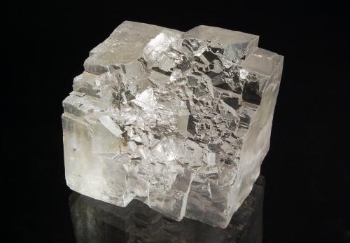 Large water-clear cubic crystal exhibiting stepped growth. (Author: crosstimber)