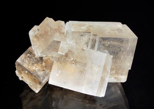 Colorless cubic halite crystals to 3 cm. This mine has been in operation for over 700 years. It contains over 2100 chambers and 4 chapels decorated entirely of salt.  Unesco lists it as one of the top 12 world attractions. (Author: crosstimber)