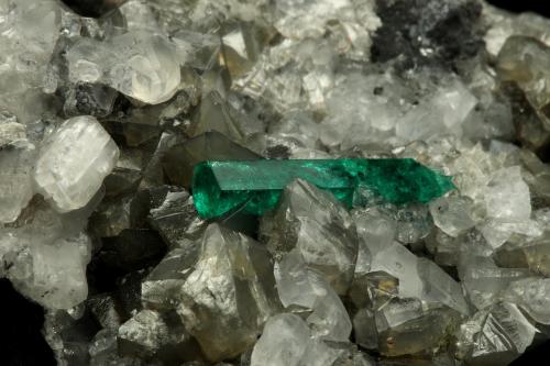 Beryl (variety emerald), Calcite, Pyrite<br />Chivor (distrito minero), Municipio Chivor, Cinturón Esmeraldífero Oriental, Departamento Boyacá, Colombia<br />65x50x70mm, xl=18mm<br /> (Author: Fiebre Verde)