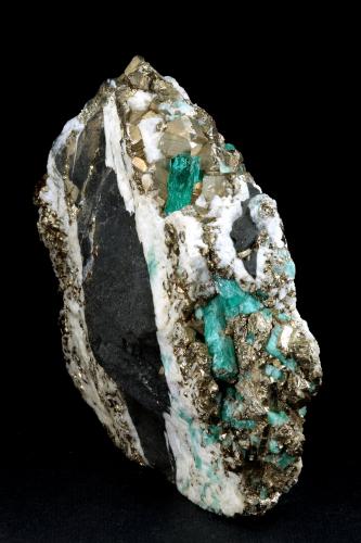 Beryl (variety emerald), Calcite, Pyrite<br />Chivor (distrito minero), Municipio Chivor, Cinturón Esmeraldífero Oriental, Departamento Boyacá, Colombia<br />102x36x87mm, xl=13mm<br /> (Author: Fiebre Verde)