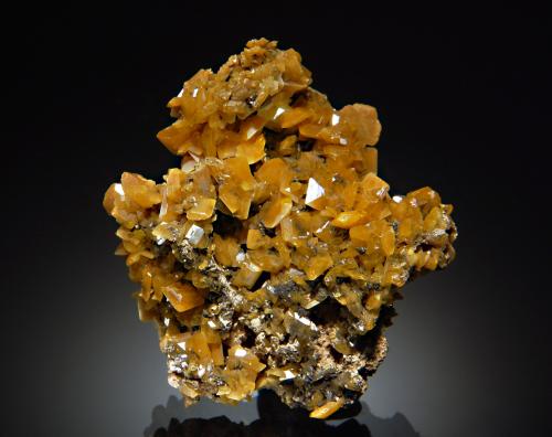 Sharp yellow wulfenite crystals to 0.8 cm. (Author: crosstimber)