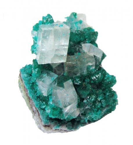 Calcite on dioptase<br />Mina Tsumeb, Tsumeb, Región Otjikoto, Namibia<br />Specimen height 2,5 cm, large calcite 1 cm<br /> (Author: Tobi)