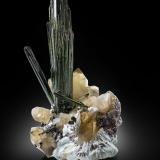 Elbaite (variety verdelite) on Quartz (variety smoky) and with Albite and 'lepidolite'Mina Cruzeiro, Santa Maria do Suaçui, Governador Valadares, Vale do Rio Doce, Minas Gerais, Brasil56 x 37 x 45 cm / main crystal: 49 cm (Author: MIM Museum)