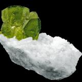 Titanite on Albite<br />Haramosh Mountains, Baltistan District, Gilgit-Baltistan (Northern Areas), Pakistan<br />4.4 × 3.5 × 3 cm<br /> (Author: Jordi Fabre)
