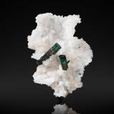 Elbaite on QuartzMina Santa Rosa, Itambacuri, Vale do Rio Doce, Minas Gerais, Brasil9,5	x	10,0	x	9,5	cm (Author: MIM Museum)