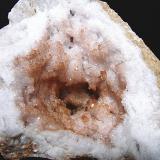 Hematite on QuartzCondado Monroe, Indiana, USAabout 10cm x 8cm the cavity (Author: Bob Harman)