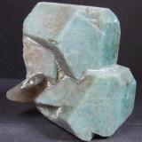Amazonite twins with smoky Quartz, allegedly from the Devils Head pegmatite in Colorado, 6.7 cm tall (Author: nurbo)