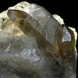 Smoky quartz
Los Alisos W Quarry, Los Alisos, Valdemanco, Madrid, Spain
17x15 cm.
Adquired in March of 2011
Fot. &amp; Col. Juan Hernandez.

Detail of the previous specimen (Author: supertxango)
