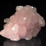 Calcite
Androvo Mine, Erma Reka, Zlatograd District, Smolyan Oblast, Bulgaria
7.5 x 9.0 cm.
Pale pink scalenohedrons with low-angle rhomb terminations.  Mined in summer 2004. (Author: crosstimber)