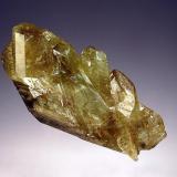 Chrysoberyl
Colatina, Espirito Santo, Brazil
2.0 x 4.0 cm.
Lustrous yellow-green to brown crystal group showing cyclic twinning. (Author: crosstimber)