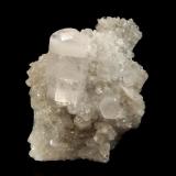 Calcite
Fozichong Mine, Cenxi Co., Wuzhou Pref., Guangxi Zhuang AR, China
6.1 x 7.2 cm
Doubly-terminated, colorless , barrel-shaped calcite crystal with opaque white zones at the terminal ends on a matrix of smaller calcite crystals. (Author: crosstimber)