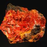 Crocoite
Red Lead Mine, Dundas Mineral field, Zeehan District, Tasmania, Australia
5.8 x 6.7 cm
Bright red-orange crocoite crystals on a brown gossan matrix. (Author: crosstimber)