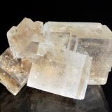 Colorless cubic halite crystals to 3 cm. This mine has been in operation for over 700 years. It contains over 2100 chambers and 4 chapels decorated entirely of salt.  Unesco lists it as one of the top 12 world attractions. (Author: crosstimber)