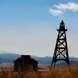 The Diamond Bell was the first mine in Butte to have a steel headframe erected in 1898. Steel headframes were often disassembled and moved to a new mine when the original site was no longer productive. (Author: crosstimber)