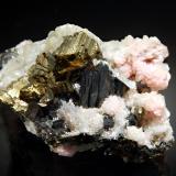 Chalcopyrite, sphalerite, rhodochrosite, and quartzDepósito Starnitsa, Campo minero Davidkovo, Montes Rhodope, Smolyan Oblast, Bulgaria3.6 x 5.2 cm (Author: crosstimber)